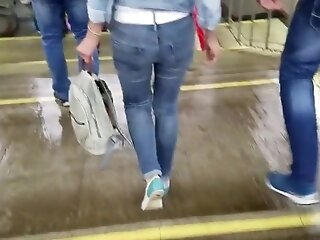 junior woman wriggle ass in tight jeans